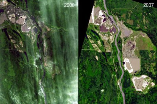 A grande demanda por petróleo tem seu preço. No Canadá, áreas próximas ao rio Athabasca foram invadidas por empresas em busca do ouro negro. O resultado foi dramático: 256 km de floresta foram devastados. (Imagem: NASA)